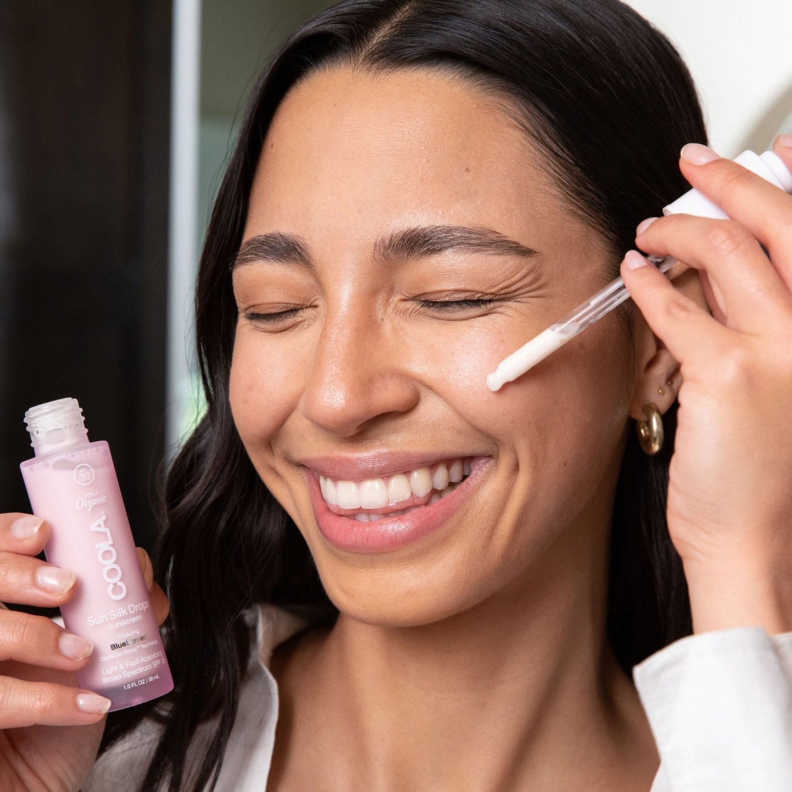 https://tns.brandcaredigital.me/wp-content/uploads/2026/06/40390-coola-sun-silk-drops-organic-face-sunscreen-spf-30-02-scaled.jpg 